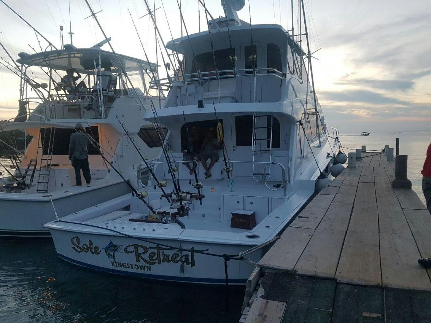 a person standing on a boat aboard SOLE RETREAT Yacht for Sale
