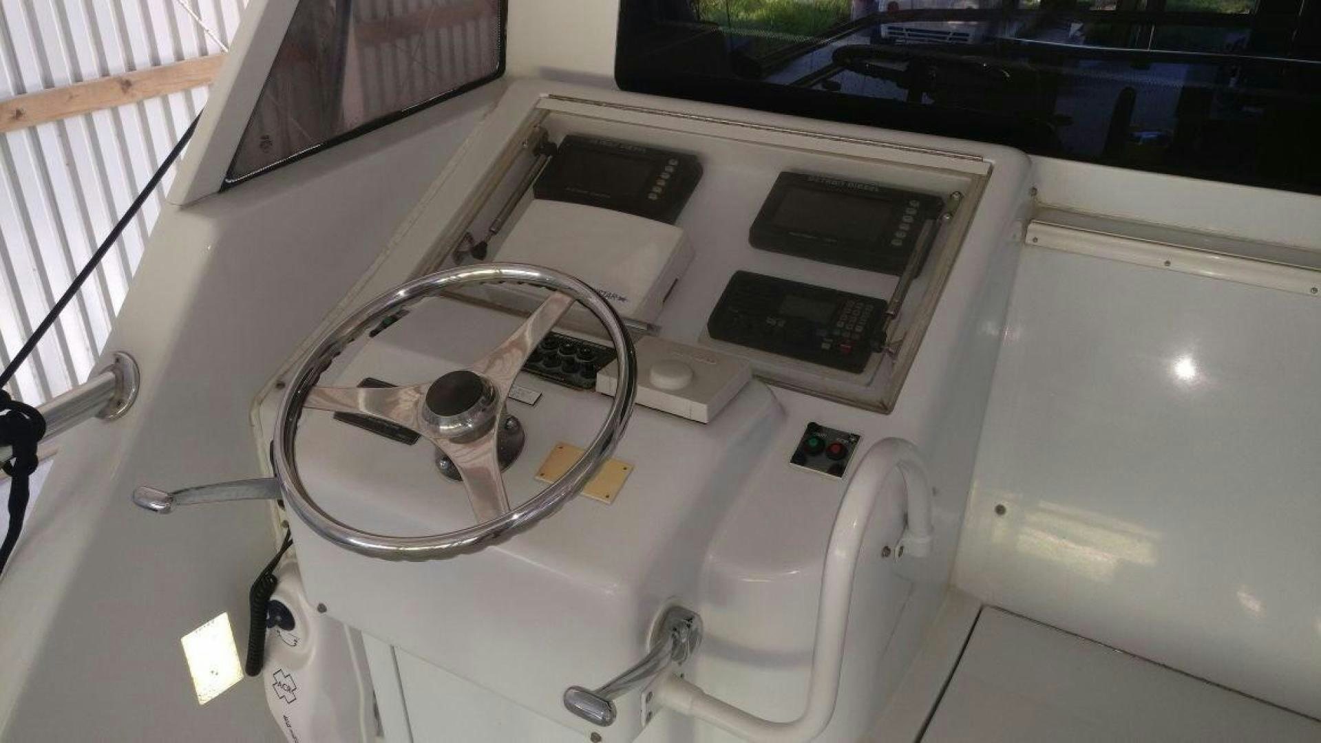 a white car with a steering wheel aboard SOLE RETREAT Yacht for Sale
