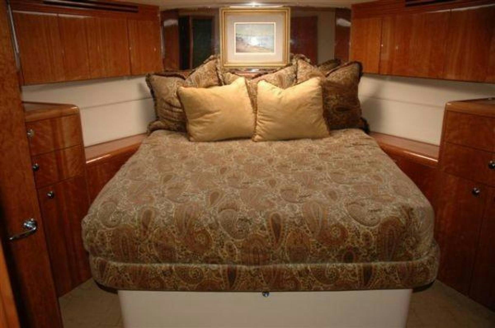 a bed with pillows aboard SOLE RETREAT Yacht for Sale