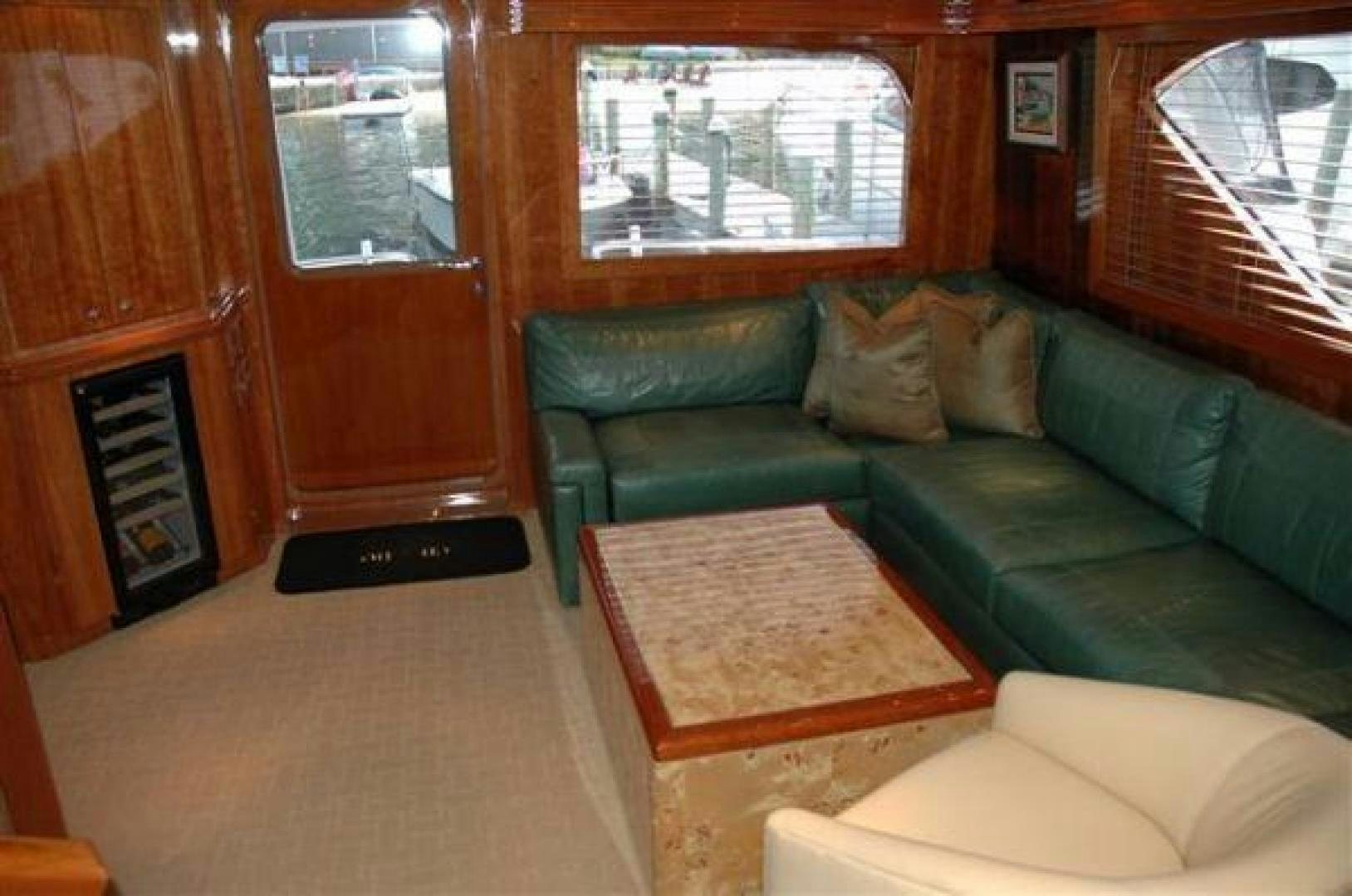 a living room with a couch and a table aboard SOLE RETREAT Yacht for Sale