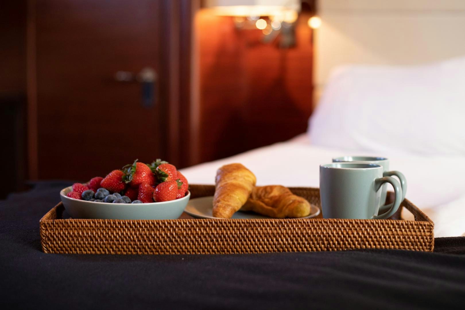 a plate of food and a cup of coffee on a table aboard MAXMARA Yacht for Sale