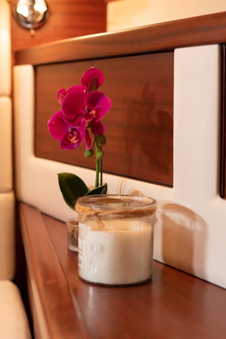 a flower in a jar aboard MAXMARA Yacht for Sale