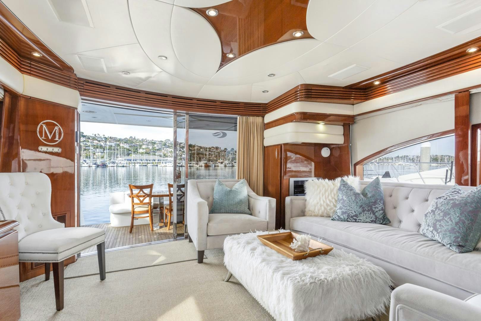 a living room with a large window aboard MONDRIAN Yacht for Sale