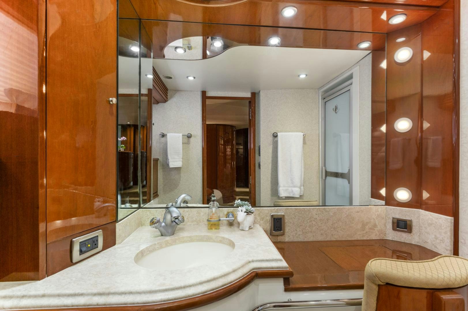 a bathroom with a large mirror aboard MONDRIAN Yacht for Sale