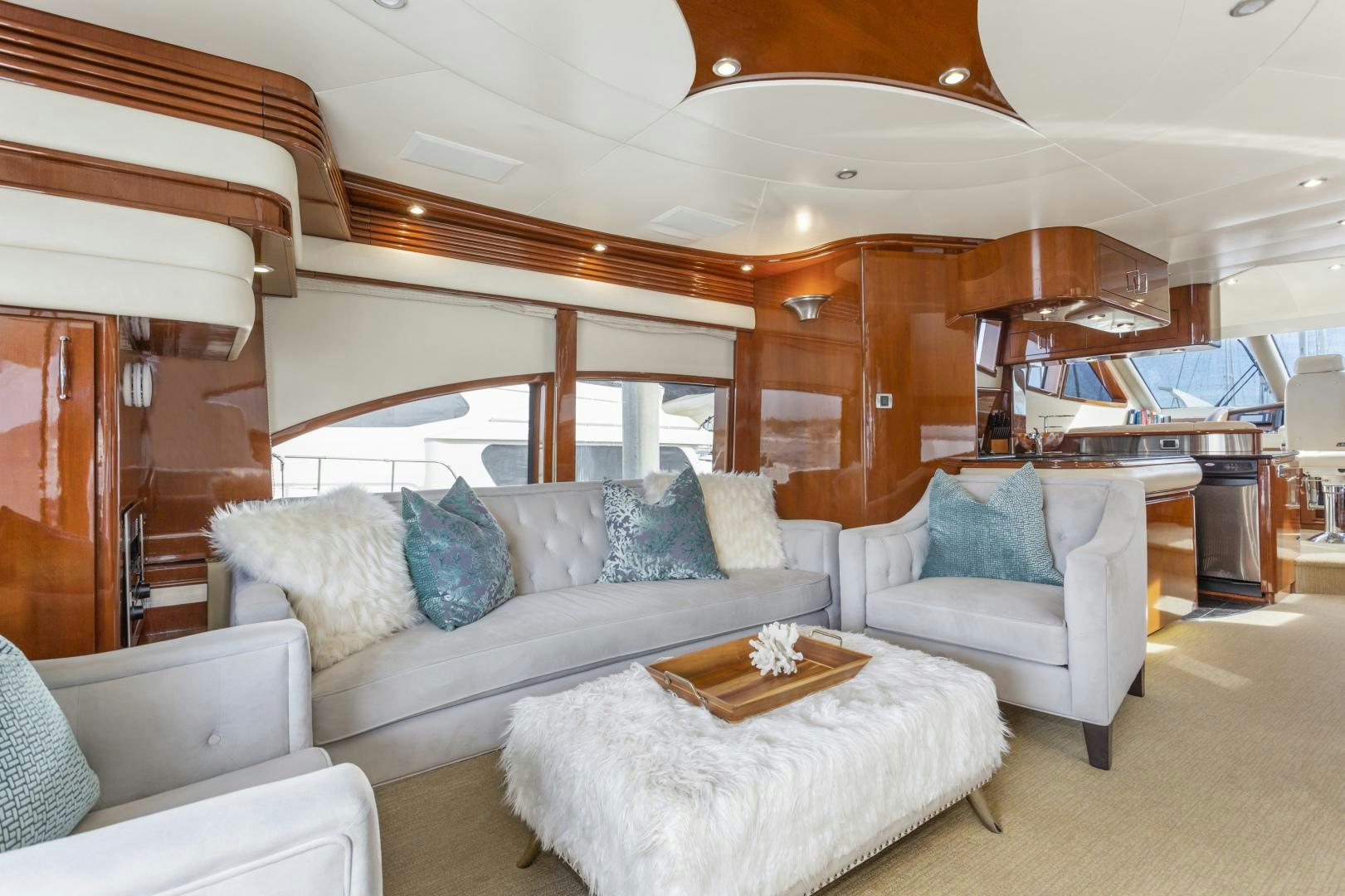a living room with a couch and a table aboard MONDRIAN Yacht for Sale
