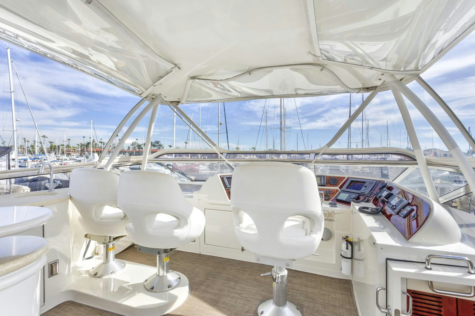 a white tent with chairs and tables aboard MONDRIAN Yacht for Sale