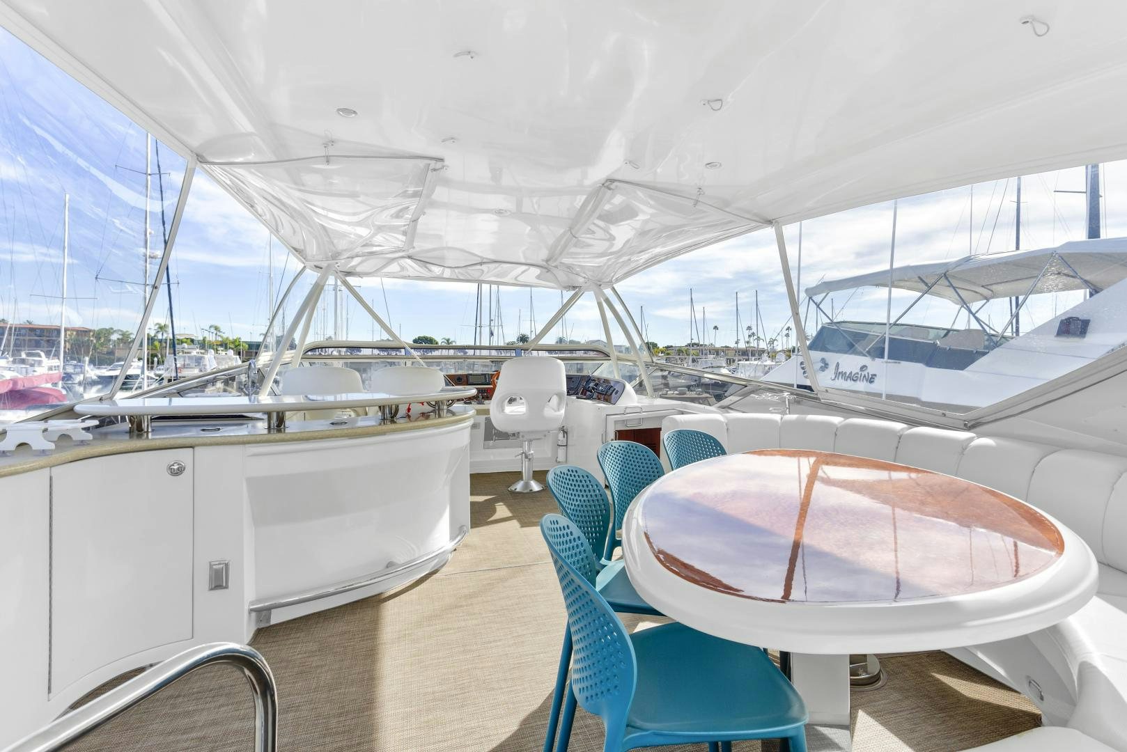 a boat with a deck and chairs aboard MONDRIAN Yacht for Sale