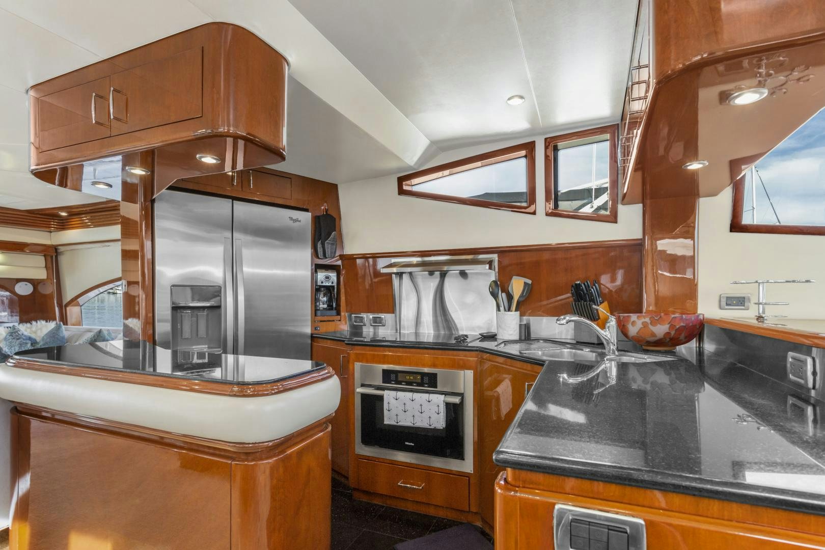 a kitchen with a stove and cabinets aboard MONDRIAN Yacht for Sale