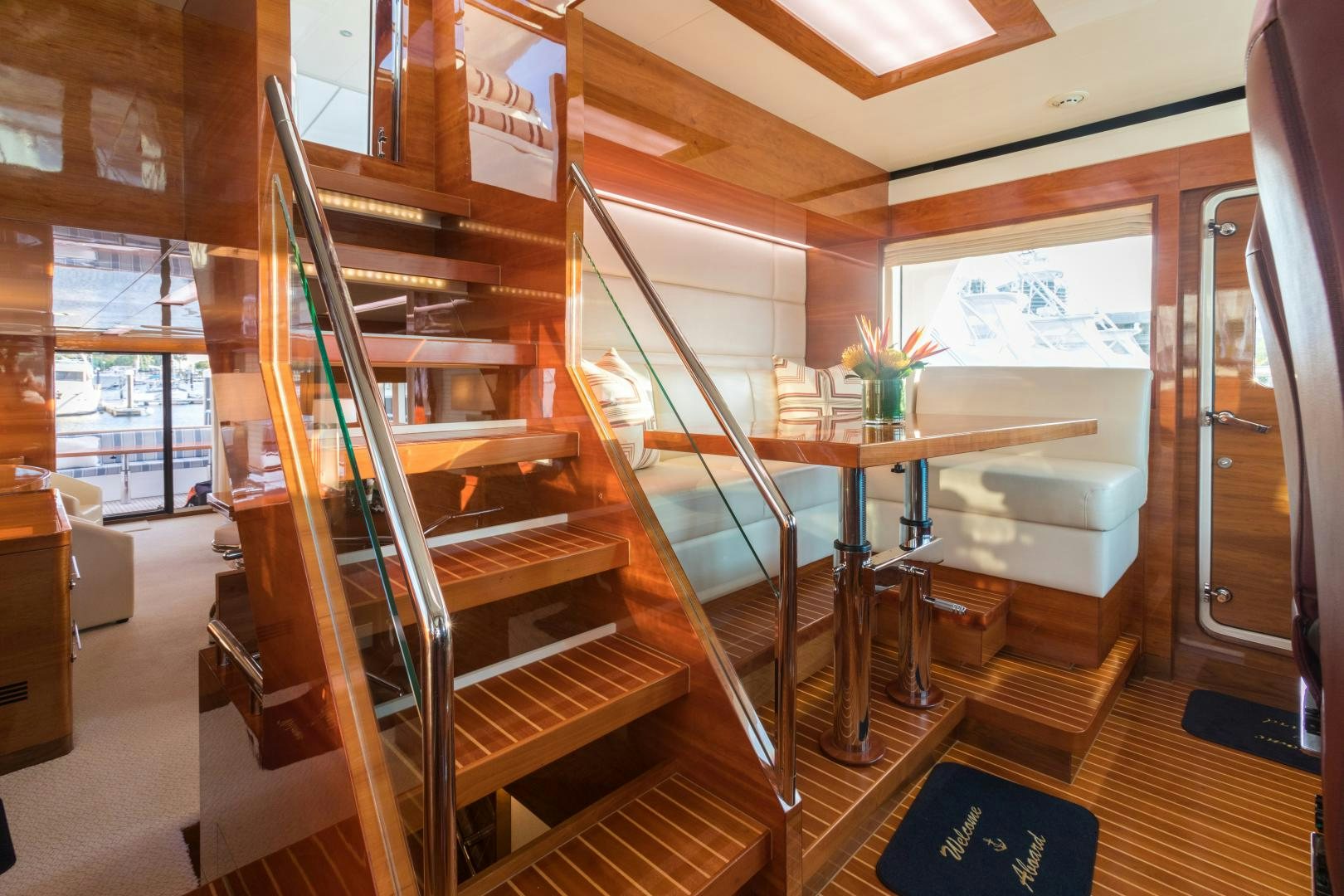 a room with a table and chairs aboard SUNNY Yacht for Sale