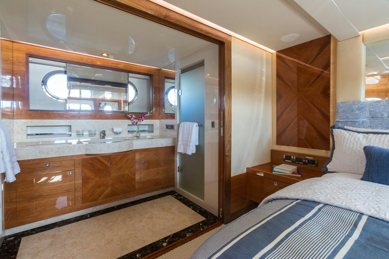 a bathroom with a sink and a mirror aboard SUNNY Yacht for Sale