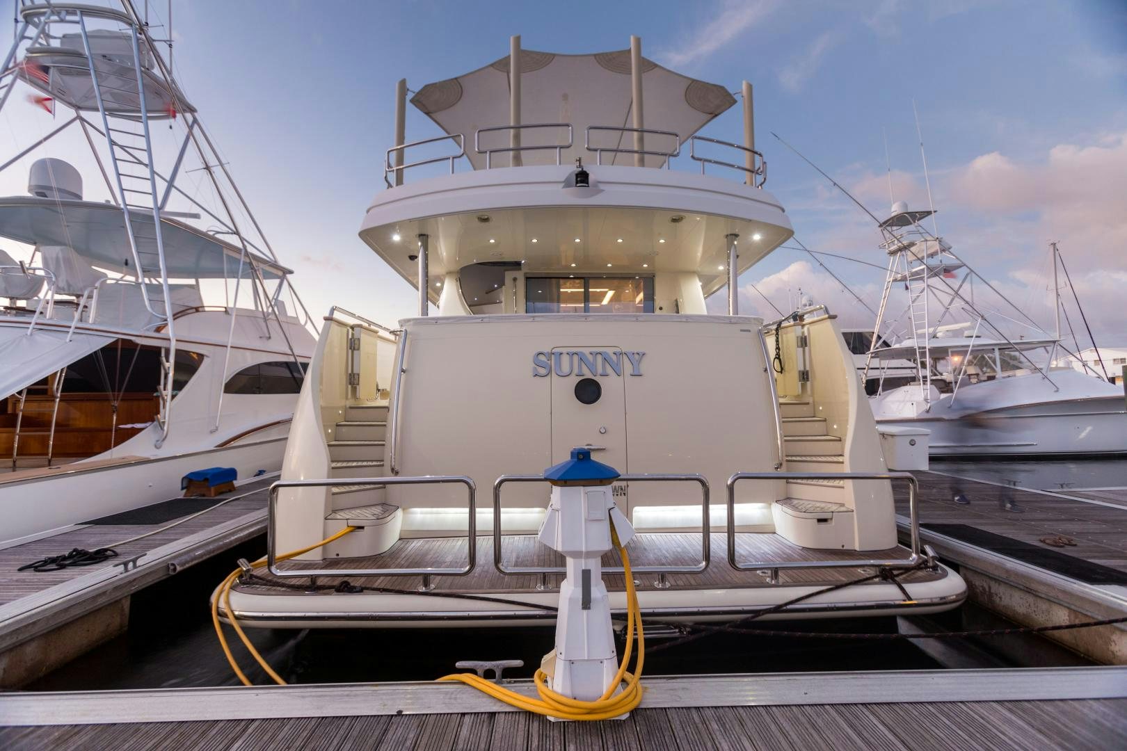 a large white boat aboard SUNNY Yacht for Sale