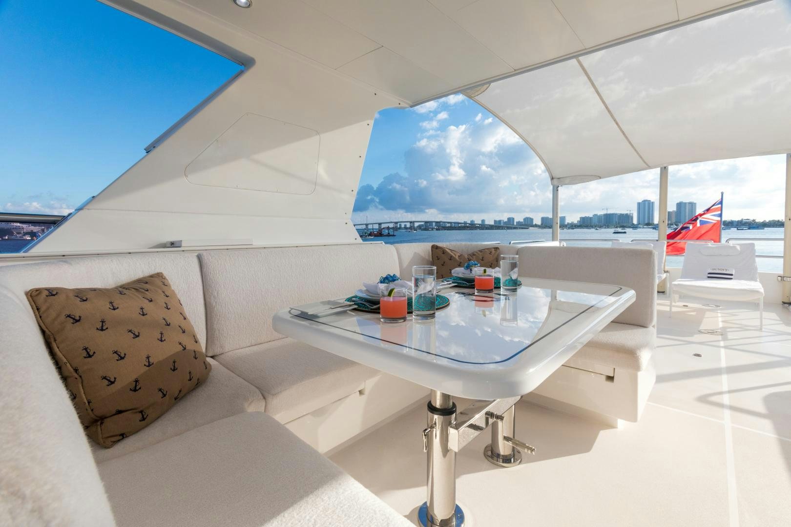a room with a table and chairs aboard SUNNY Yacht for Sale