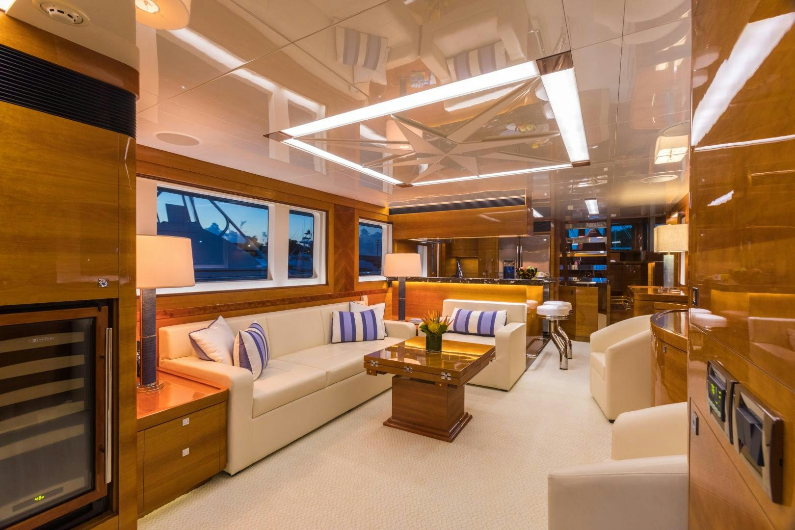 a living room with a large screen aboard SUNNY Yacht for Sale