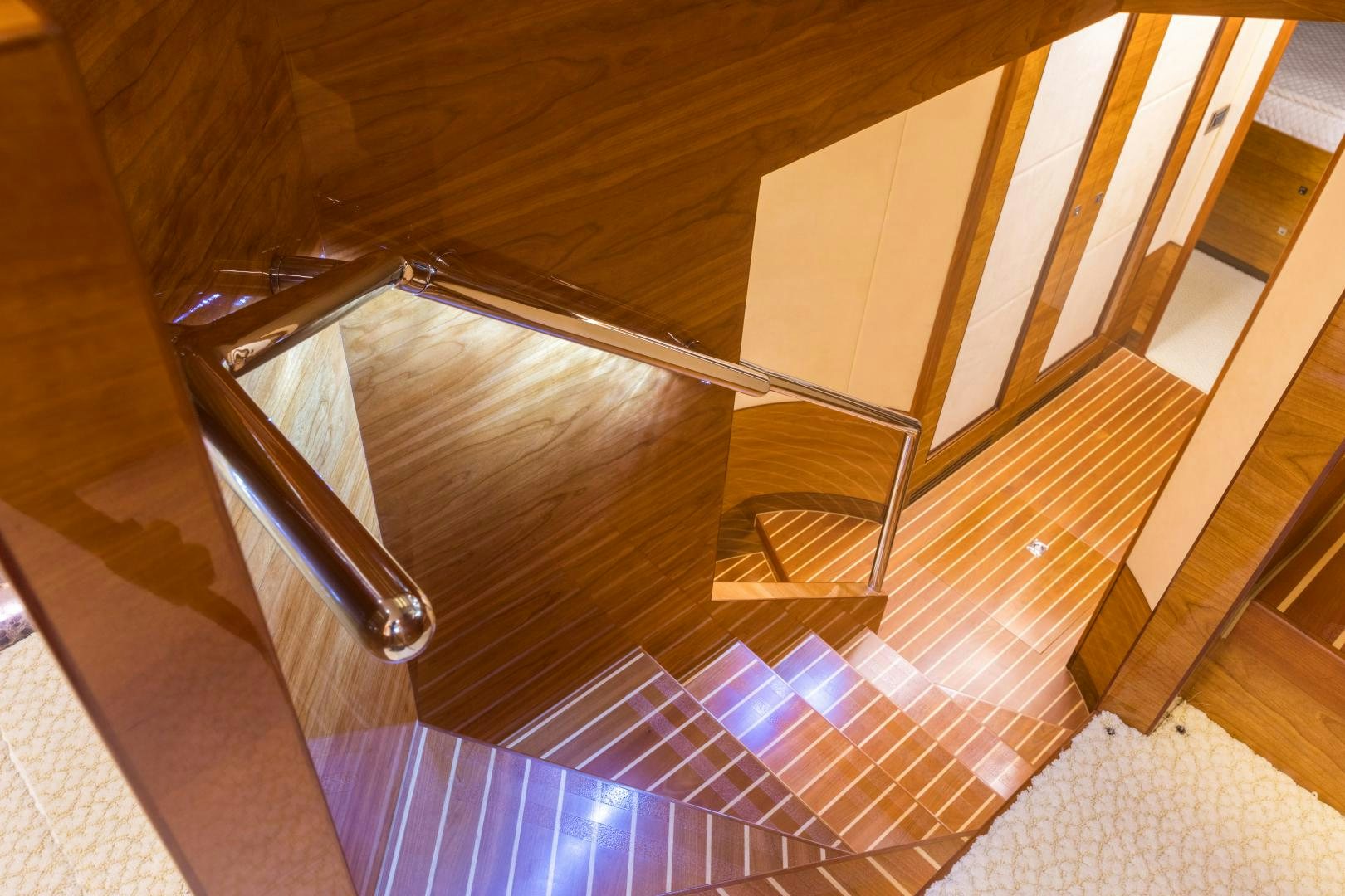 a staircase with a light aboard SUNNY Yacht for Sale