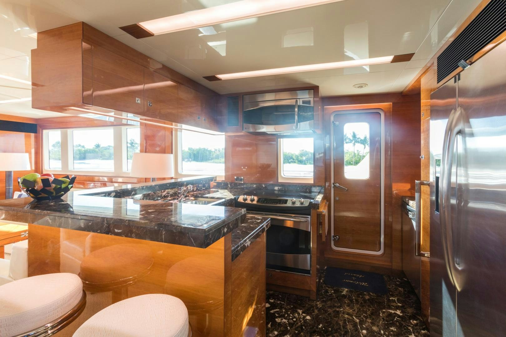 a kitchen with a large island aboard SUNNY Yacht for Sale