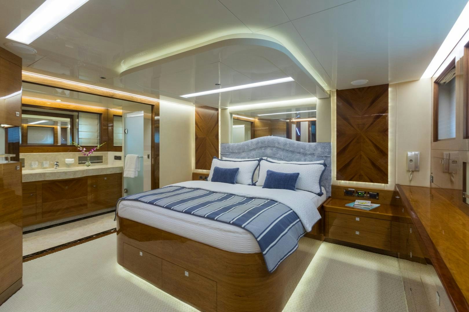 a room with a bed and a desk aboard SUNNY Yacht for Sale