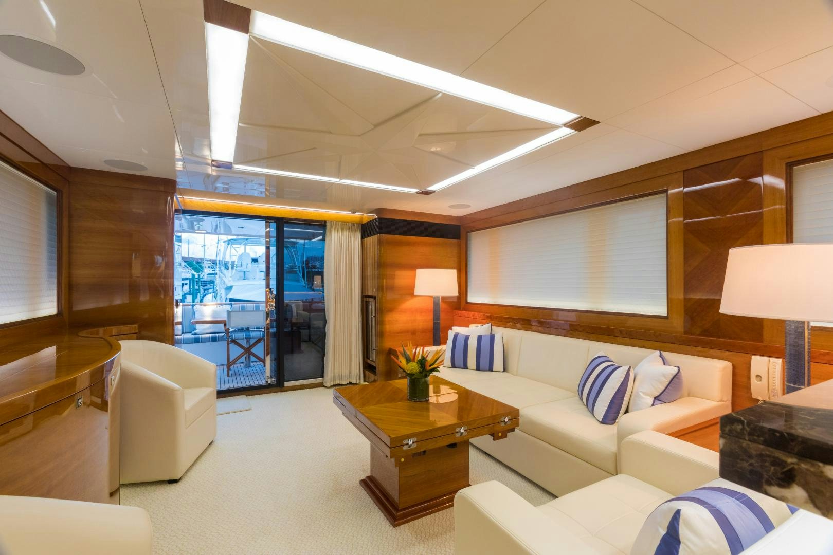 a living room with a large window aboard SUNNY Yacht for Sale