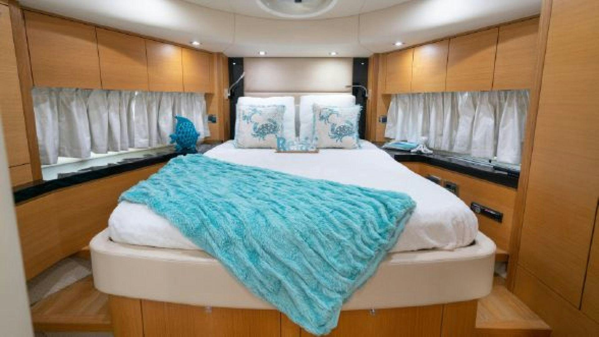 a couple of beds in a room aboard MANCUSA Yacht for Sale