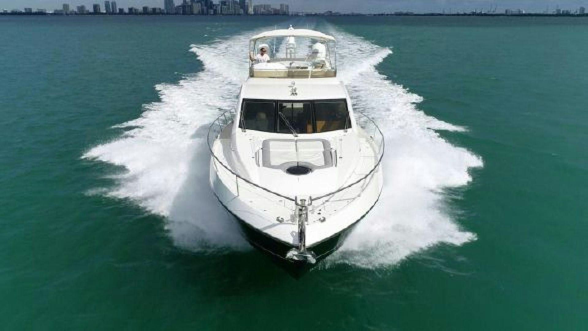 a white boat in the water aboard MANCUSA Yacht for Sale