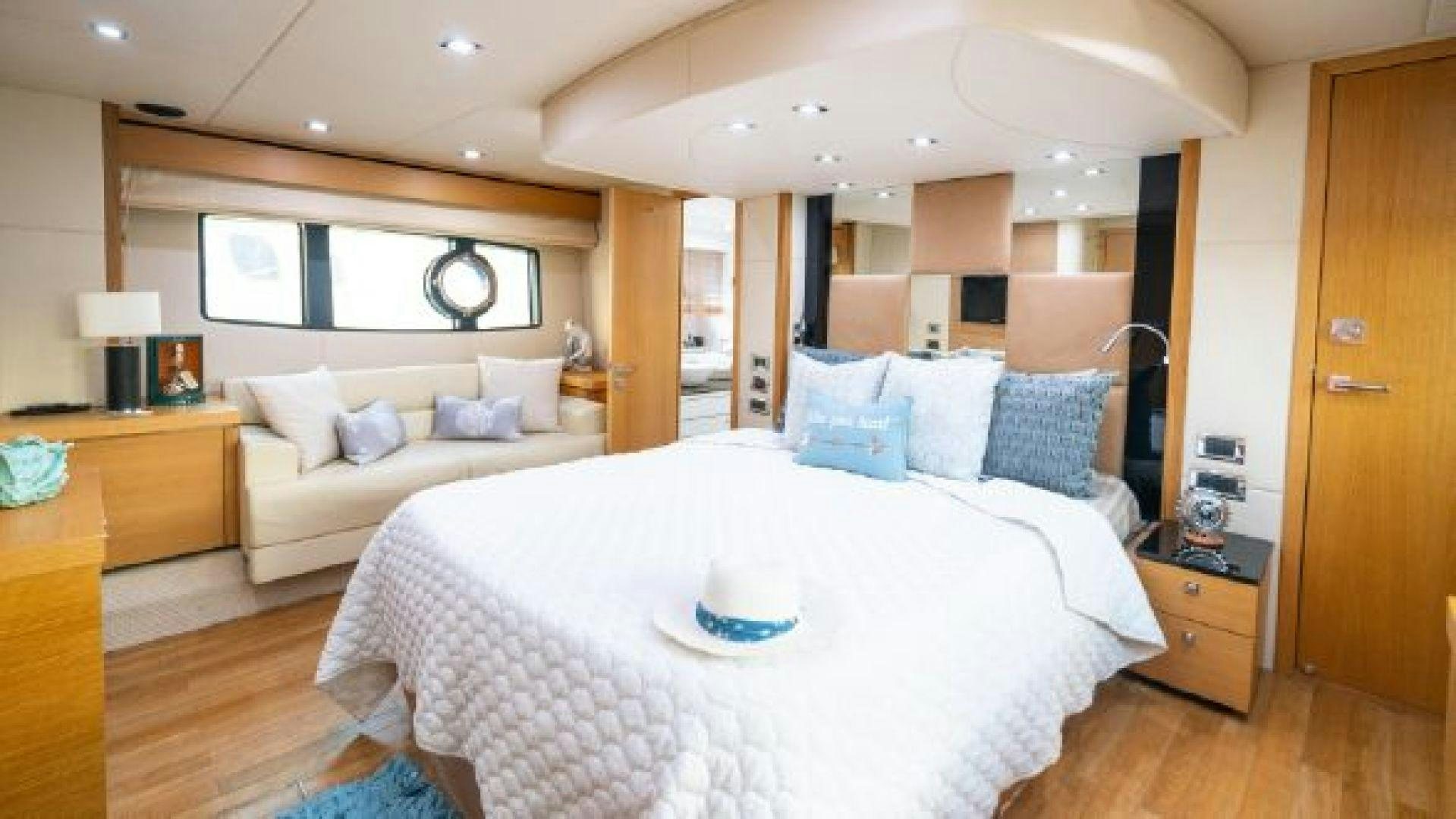 a room with a bed and a desk aboard MANCUSA Yacht for Sale