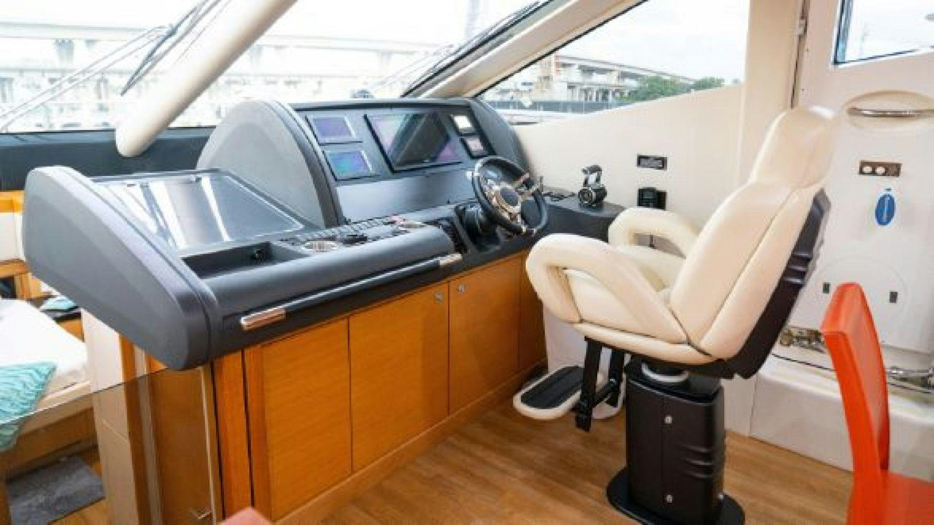a car on a table aboard MANCUSA Yacht for Sale