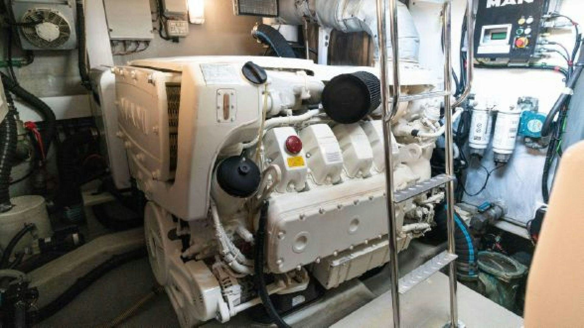 a machine with a large piece of equipment on it aboard MANCUSA Yacht for Sale