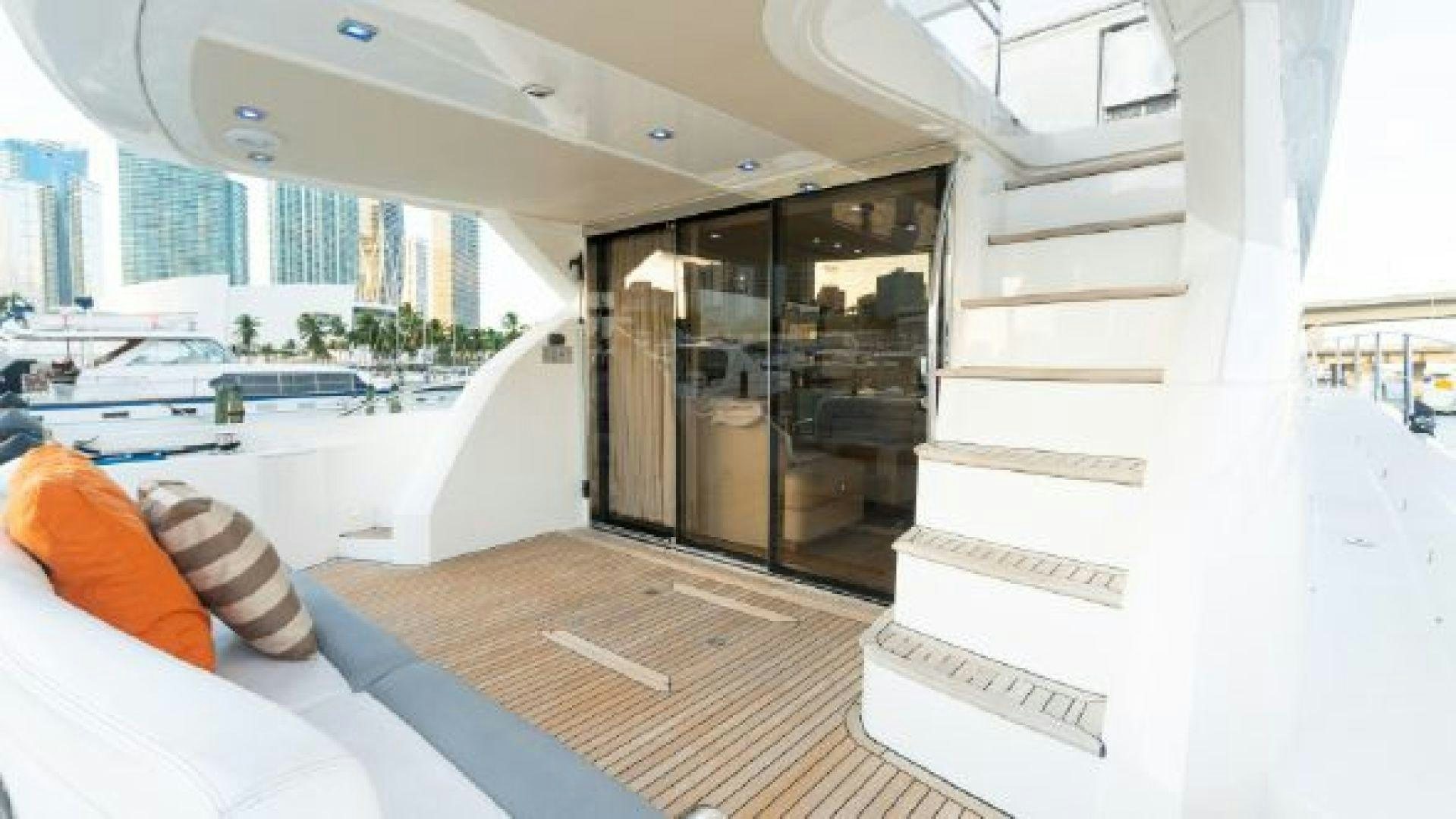 a room with a bed and a desk aboard MANCUSA Yacht for Sale