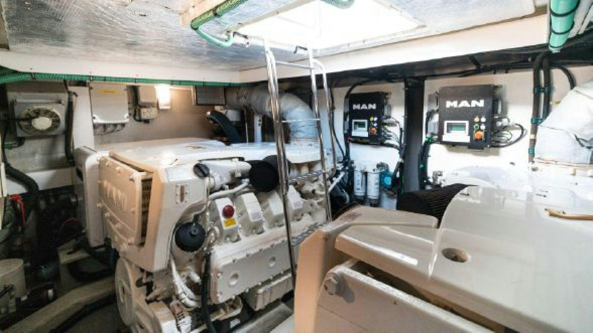 a large machine in a factory aboard MANCUSA Yacht for Sale