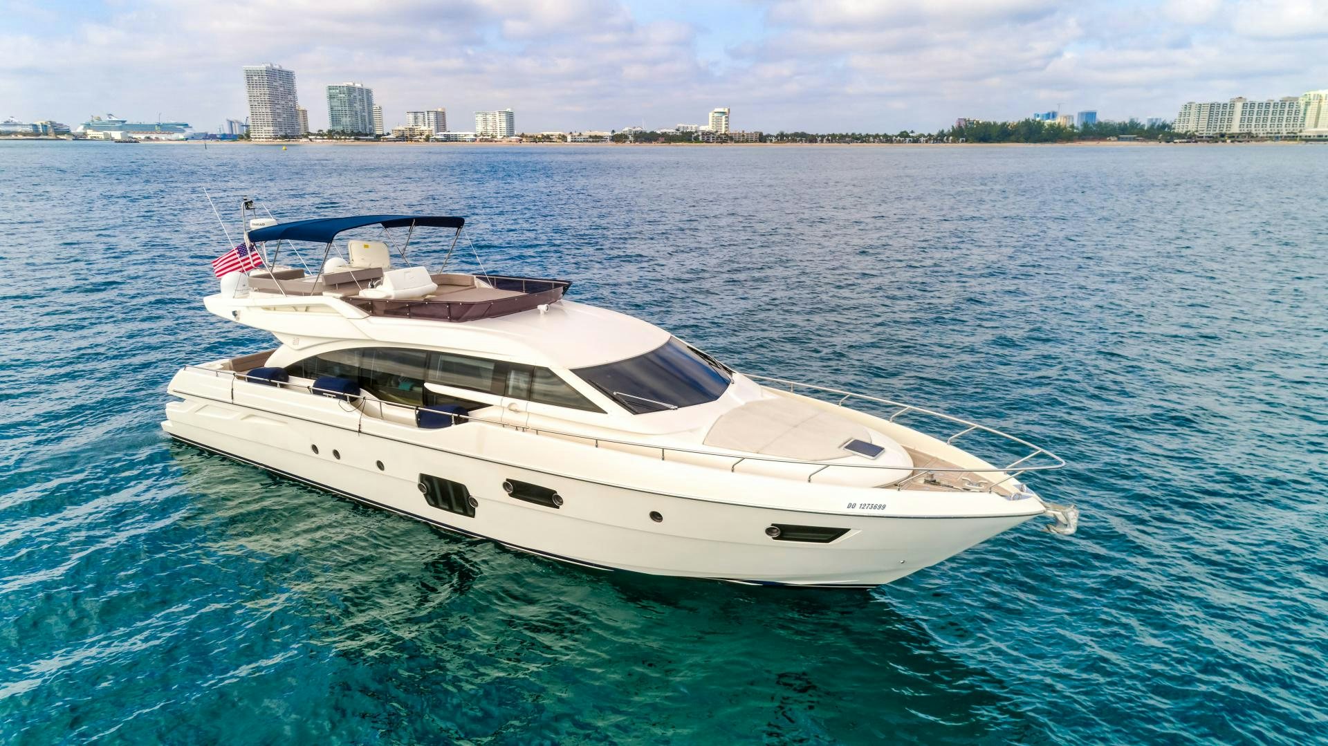 a white yacht on the water aboard KAOS II Yacht for Sale