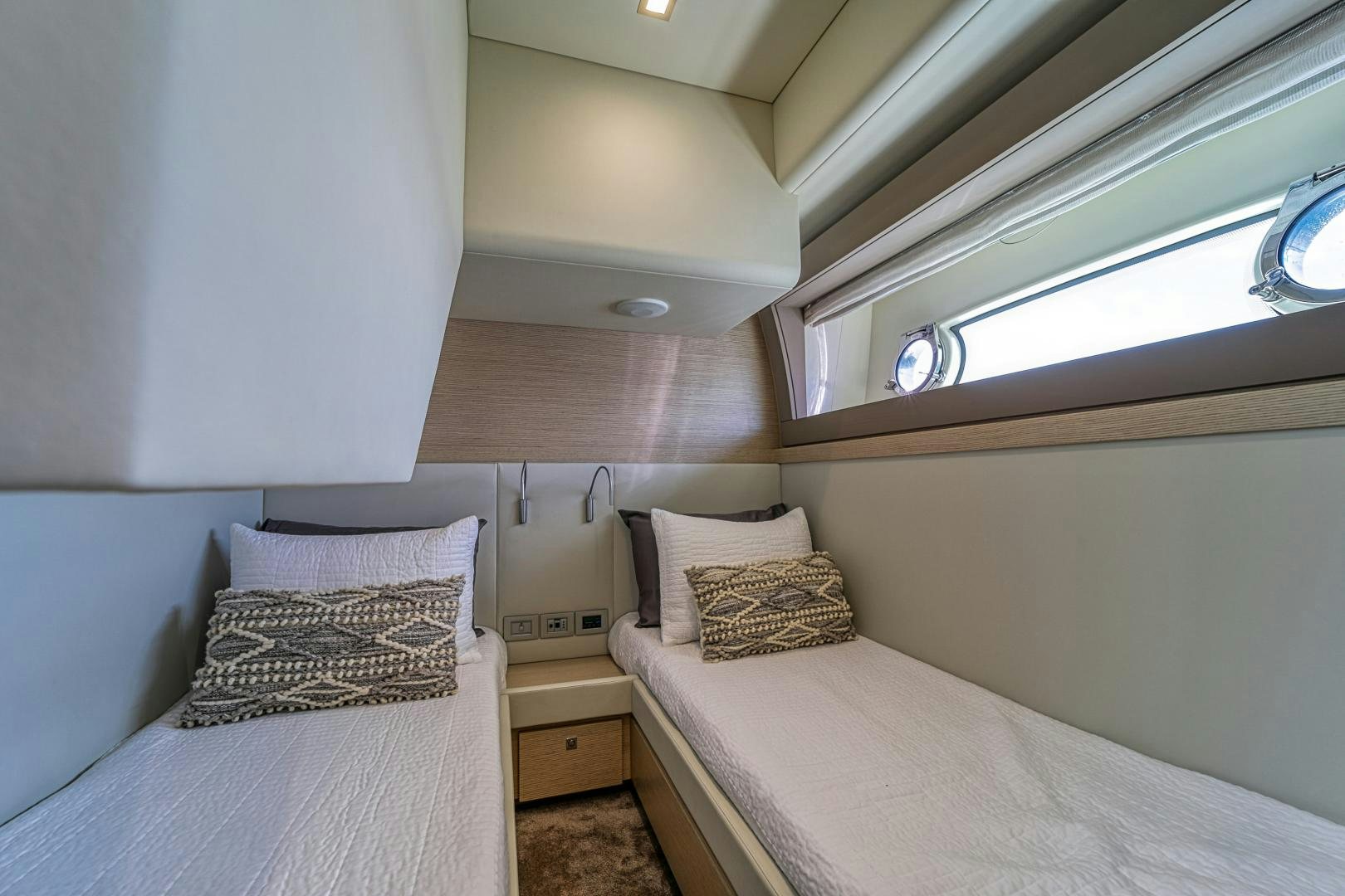 a couple of beds in a room aboard KAOS II Yacht for Sale