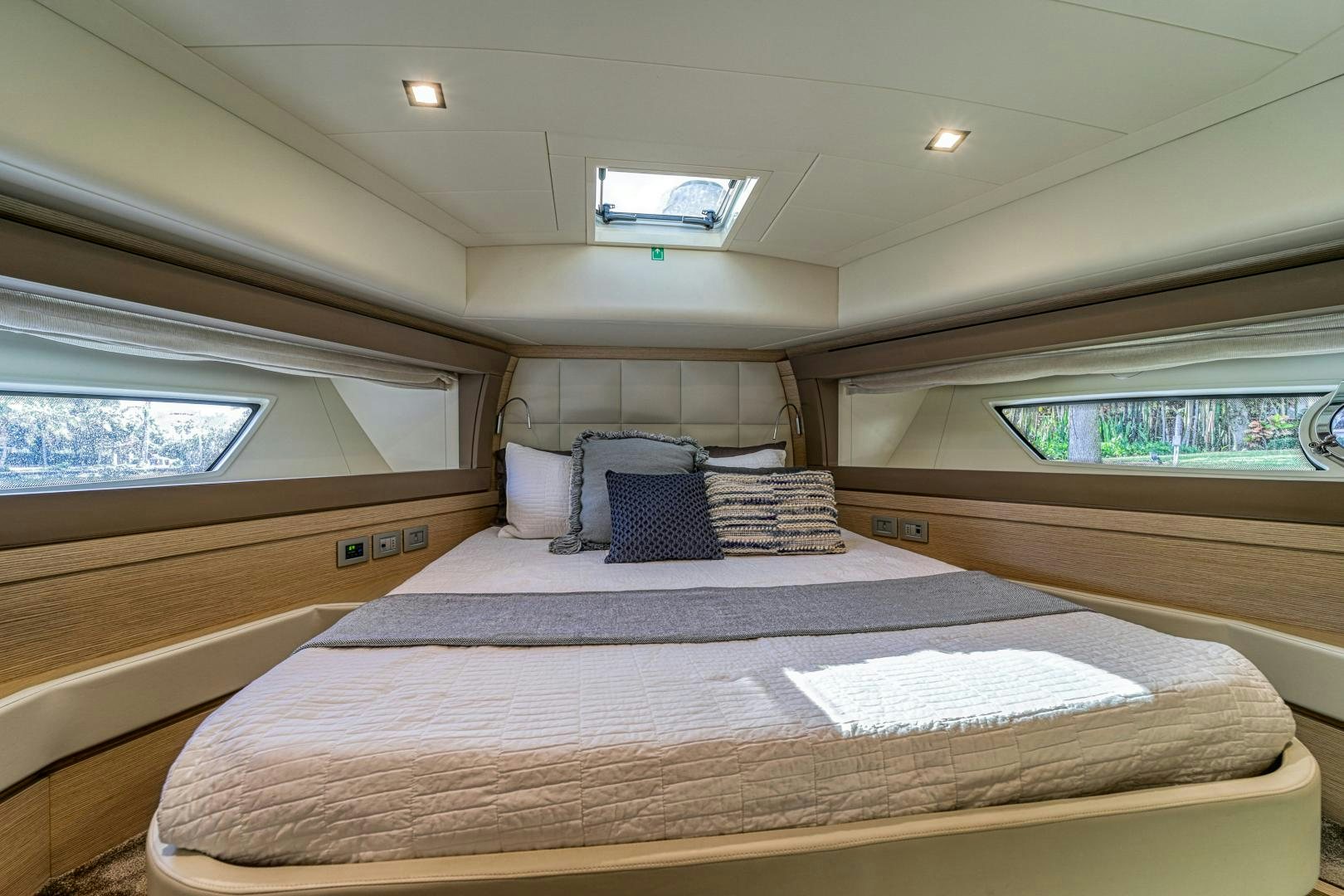 a bed in a room aboard KAOS II Yacht for Sale