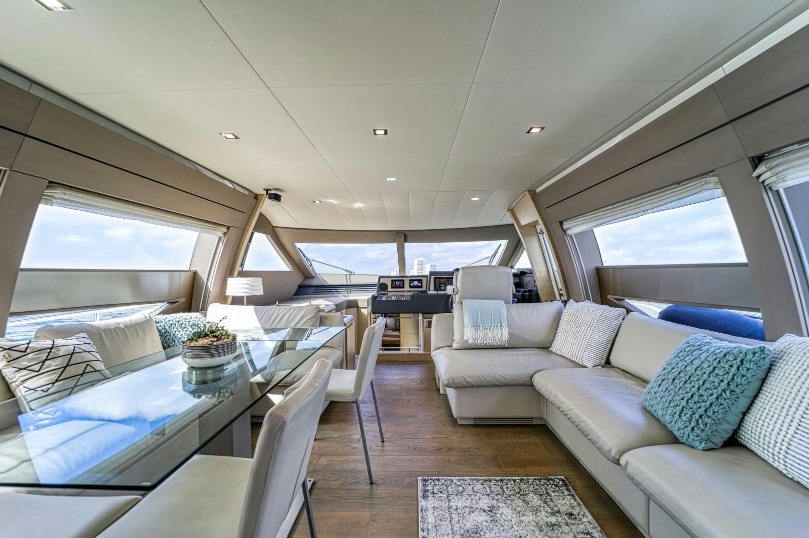a living room with a large window aboard KAOS II Yacht for Sale