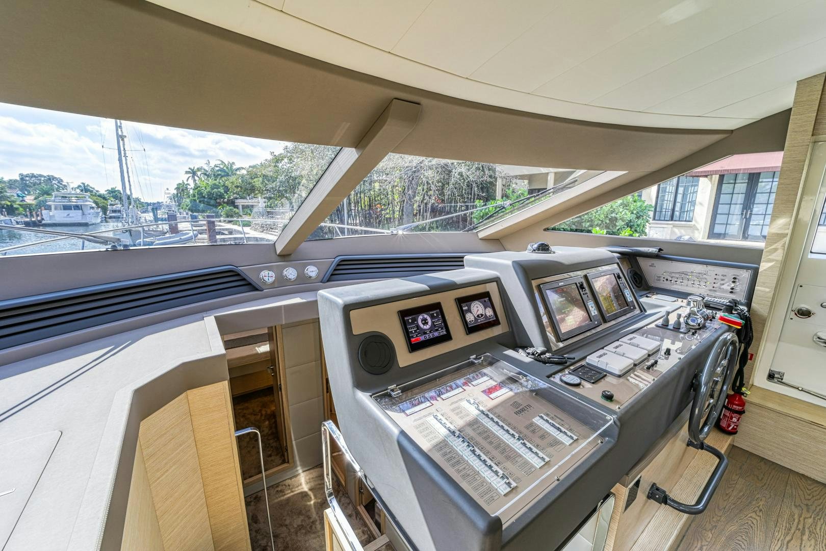 a table with electronic devices on it aboard KAOS II Yacht for Sale