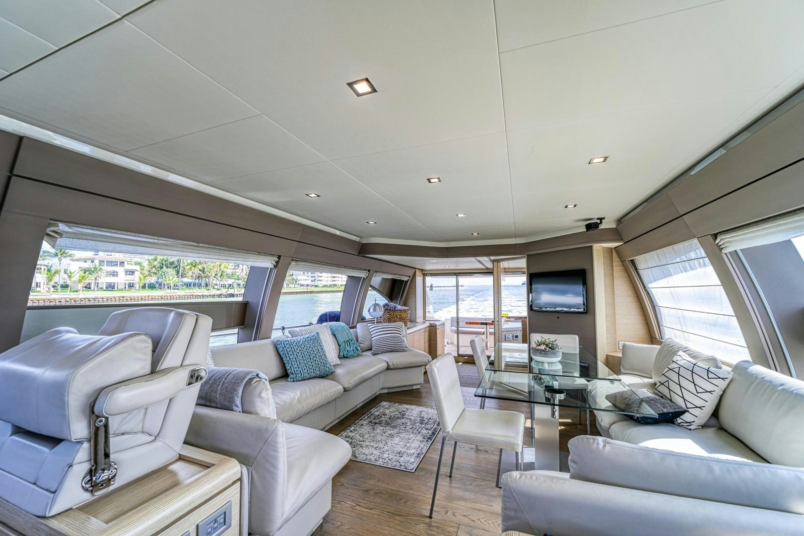 a living room with a large window aboard KAOS II Yacht for Sale
