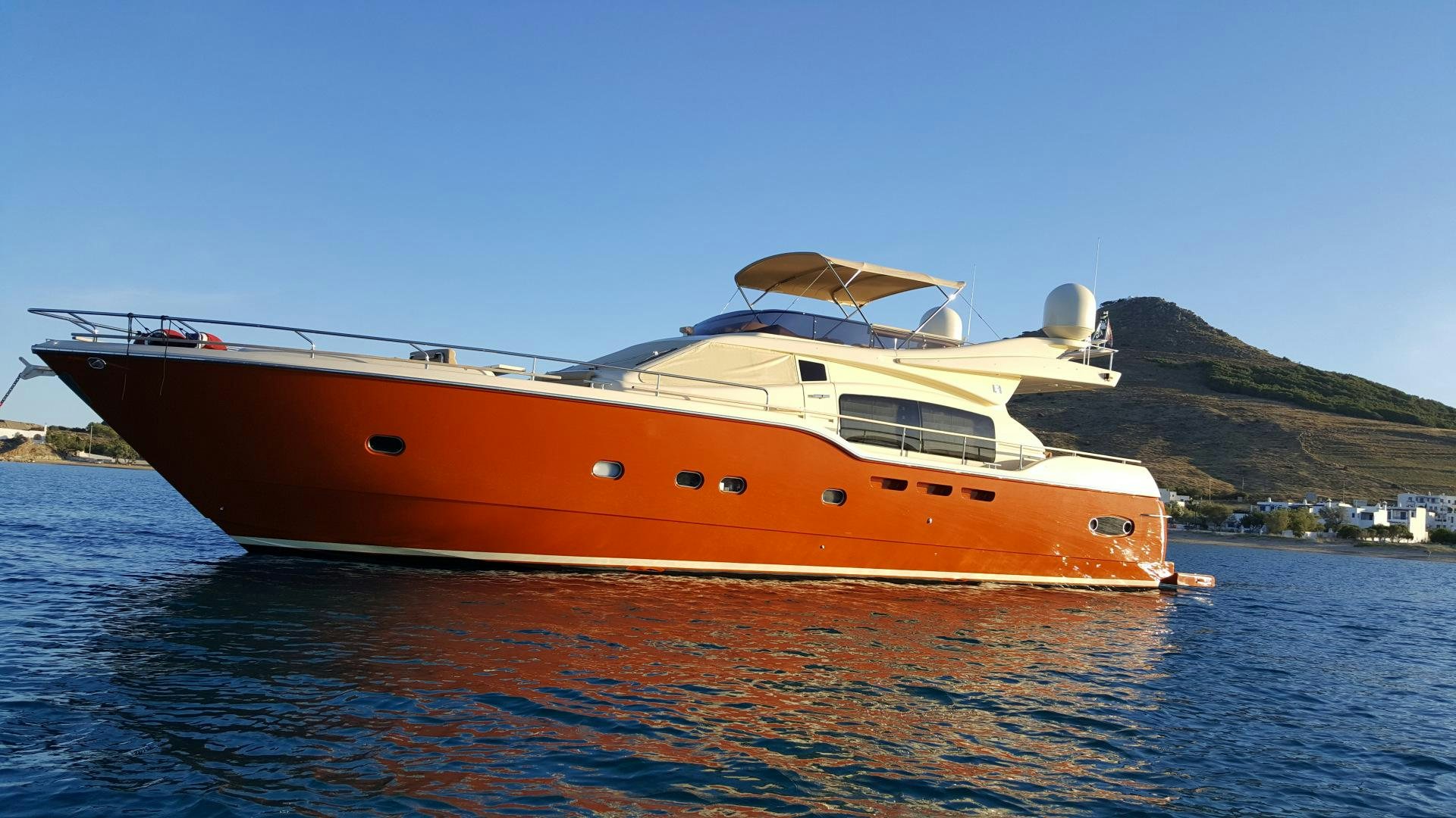 a large white boat on the water aboard TESA Yacht for Sale