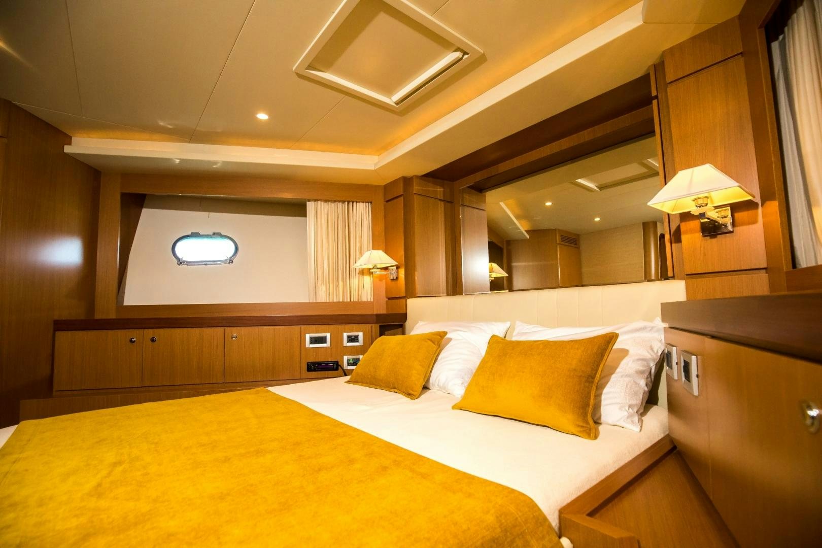 a hotel room with a bed aboard TESA Yacht for Sale