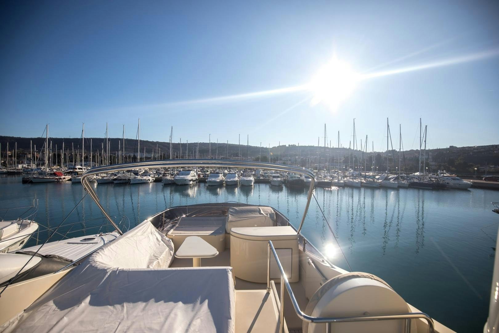 a boat in a harbor aboard TESA Yacht for Sale