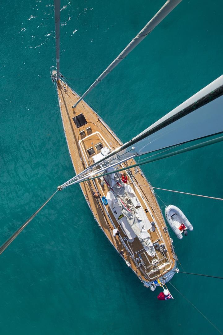 a large boat on the water aboard simple harmony Yacht for Sale