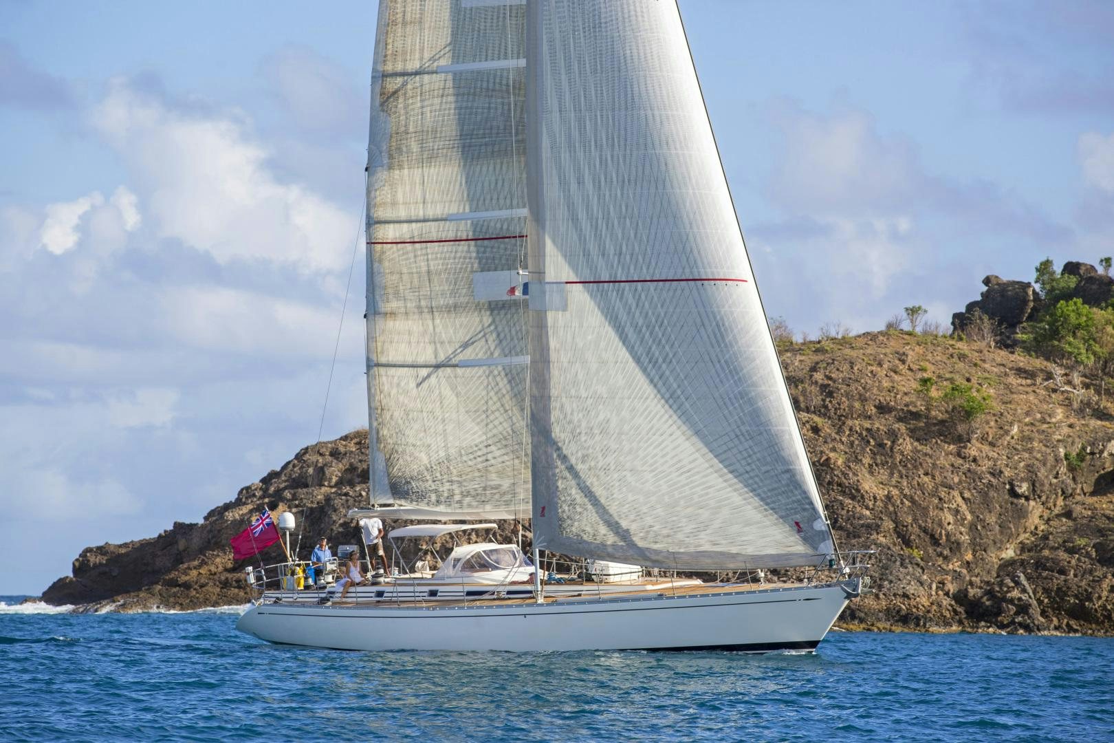 a sailboat on the water aboard simple harmony Yacht for Sale