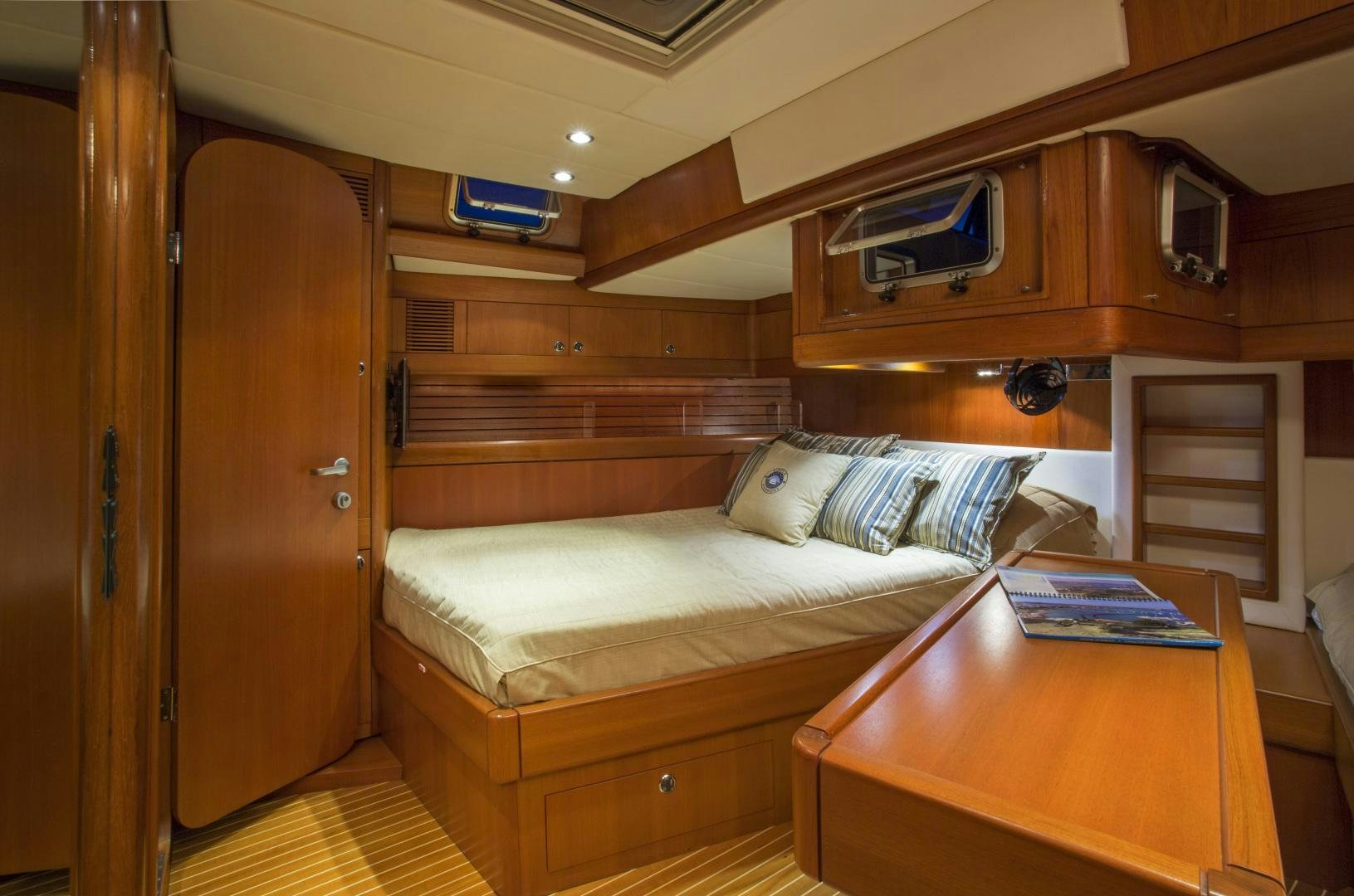 a bed in a cabin aboard simple harmony Yacht for Sale