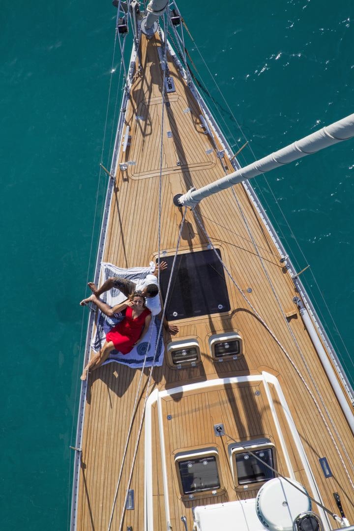 a person on a boat aboard simple harmony Yacht for Sale