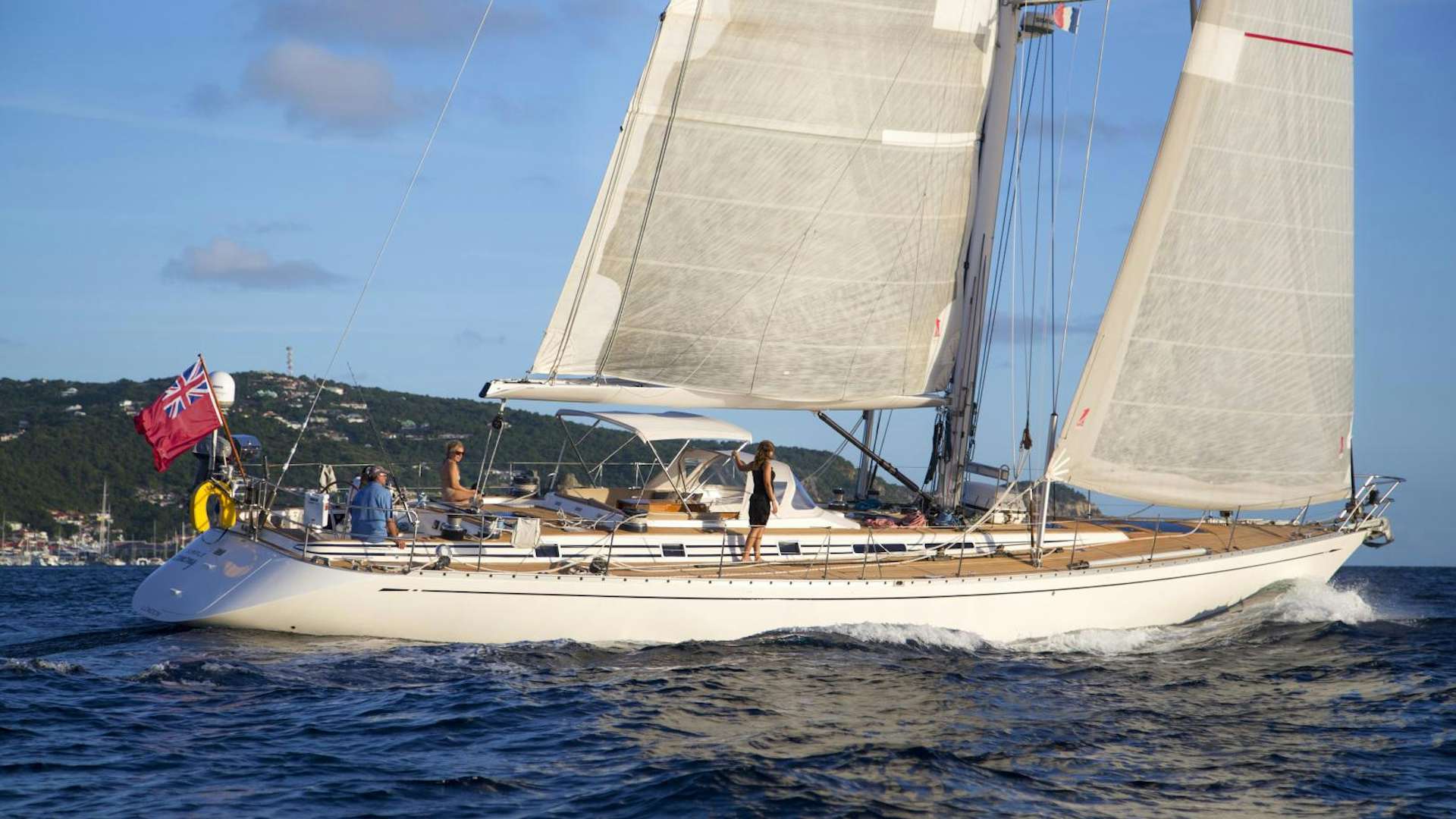 a sailboat on the water aboard simple harmony Yacht for Sale