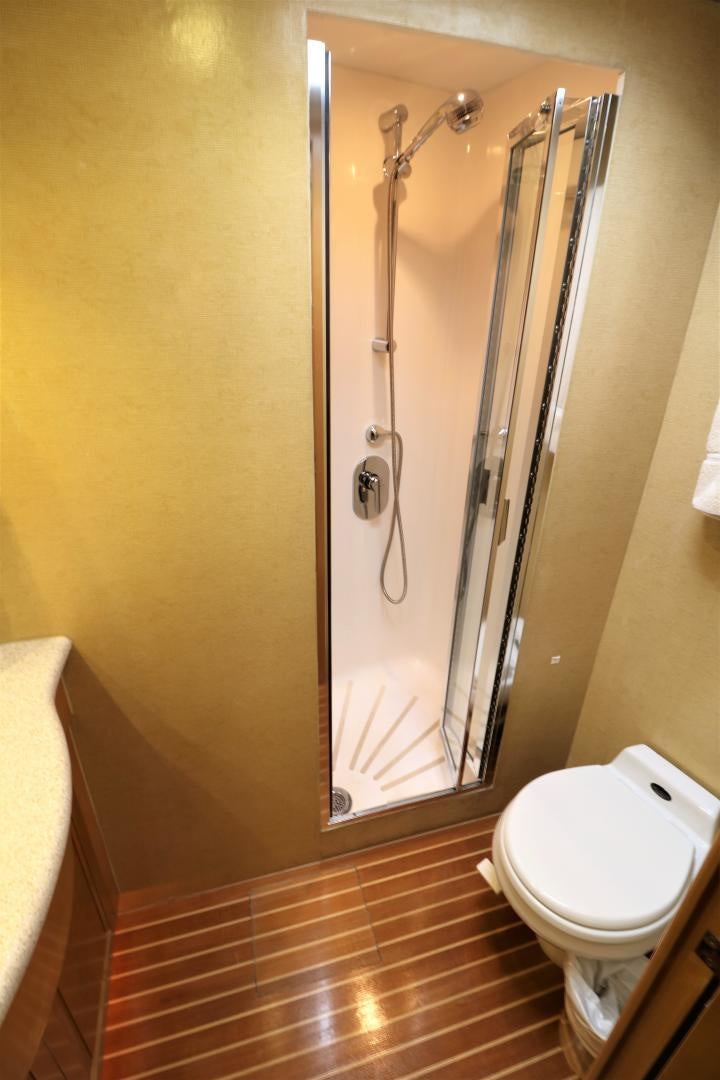 a shower with a glass door aboard No Name Yacht for Sale