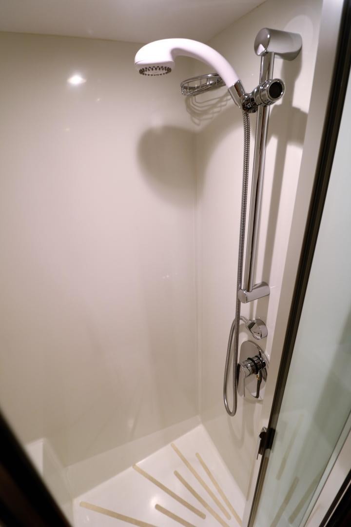 a shower with a glass door aboard No Name Yacht for Sale
