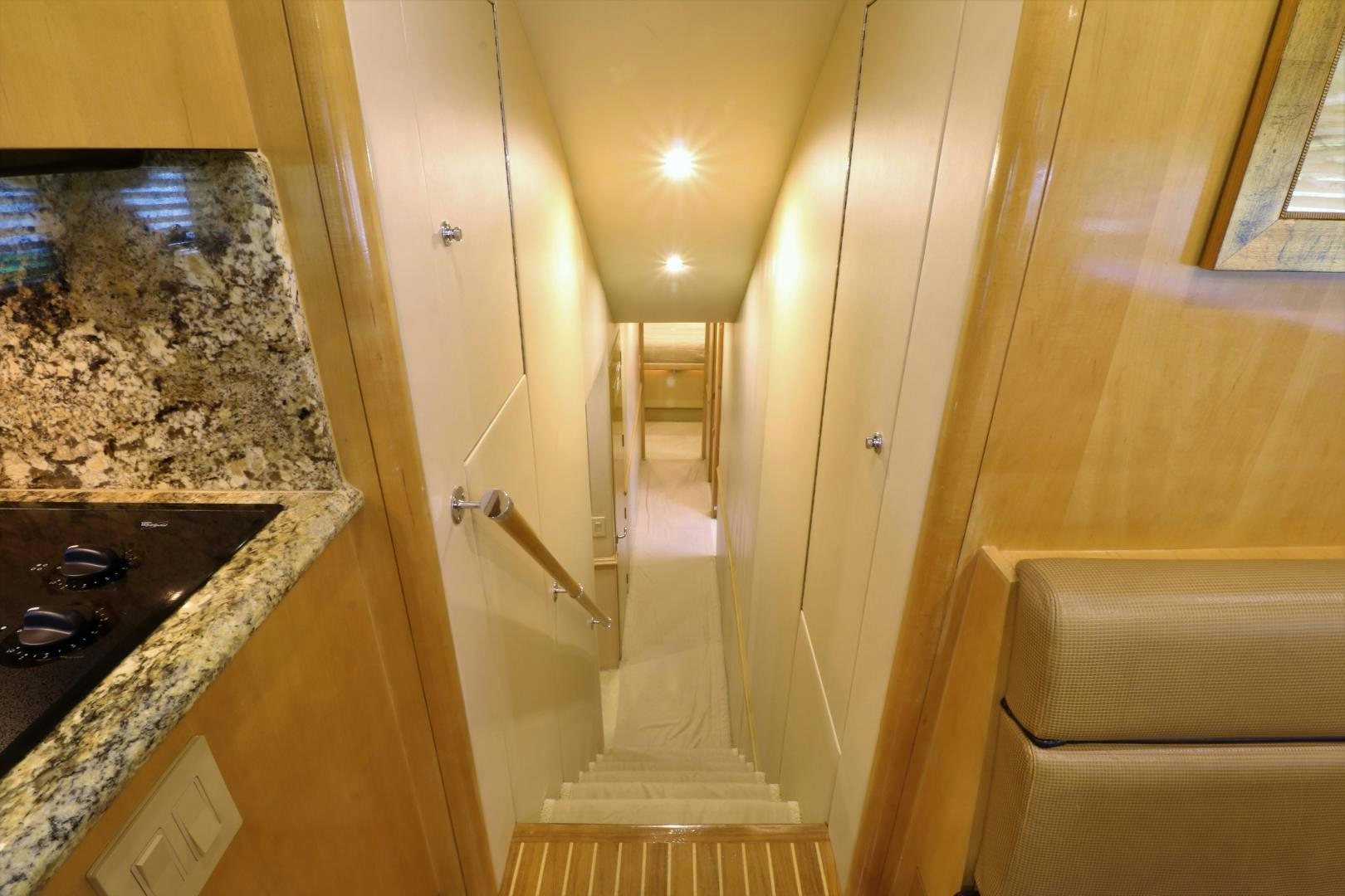 a bathroom with a marble countertop aboard No Name Yacht for Sale