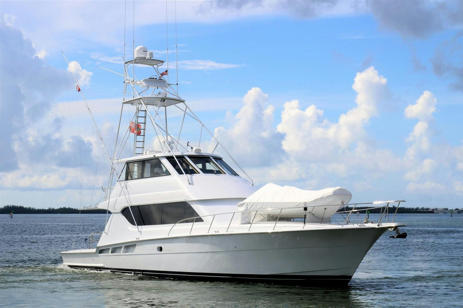 a white boat on the water aboard No Name Yacht for Sale