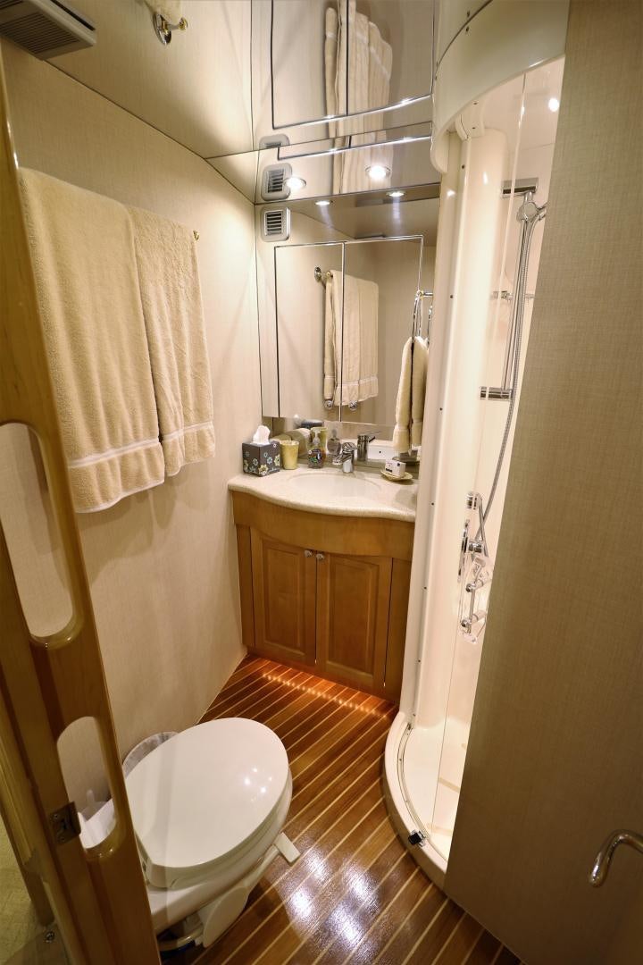 a bathroom with a toilet and sink aboard No Name Yacht for Sale