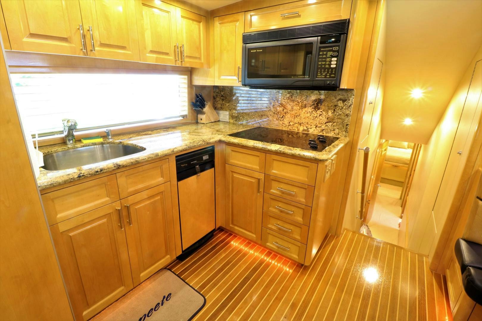 a kitchen with granite counter tops aboard No Name Yacht for Sale