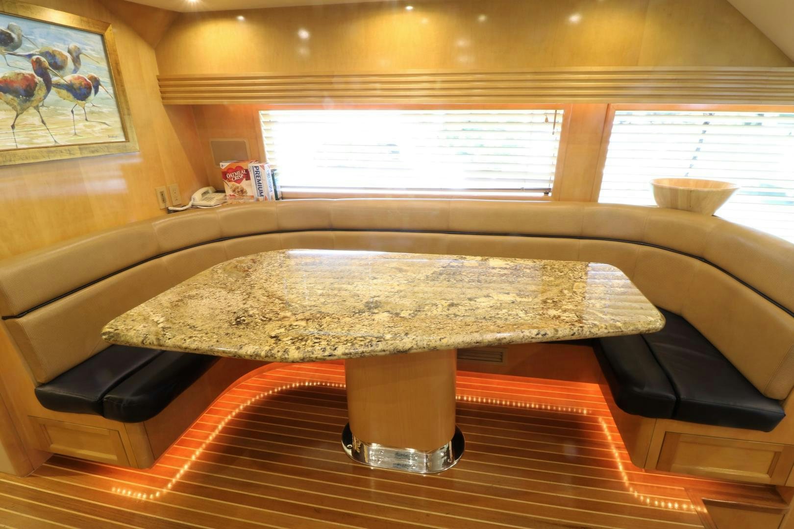 a round table with a round table aboard No Name Yacht for Sale