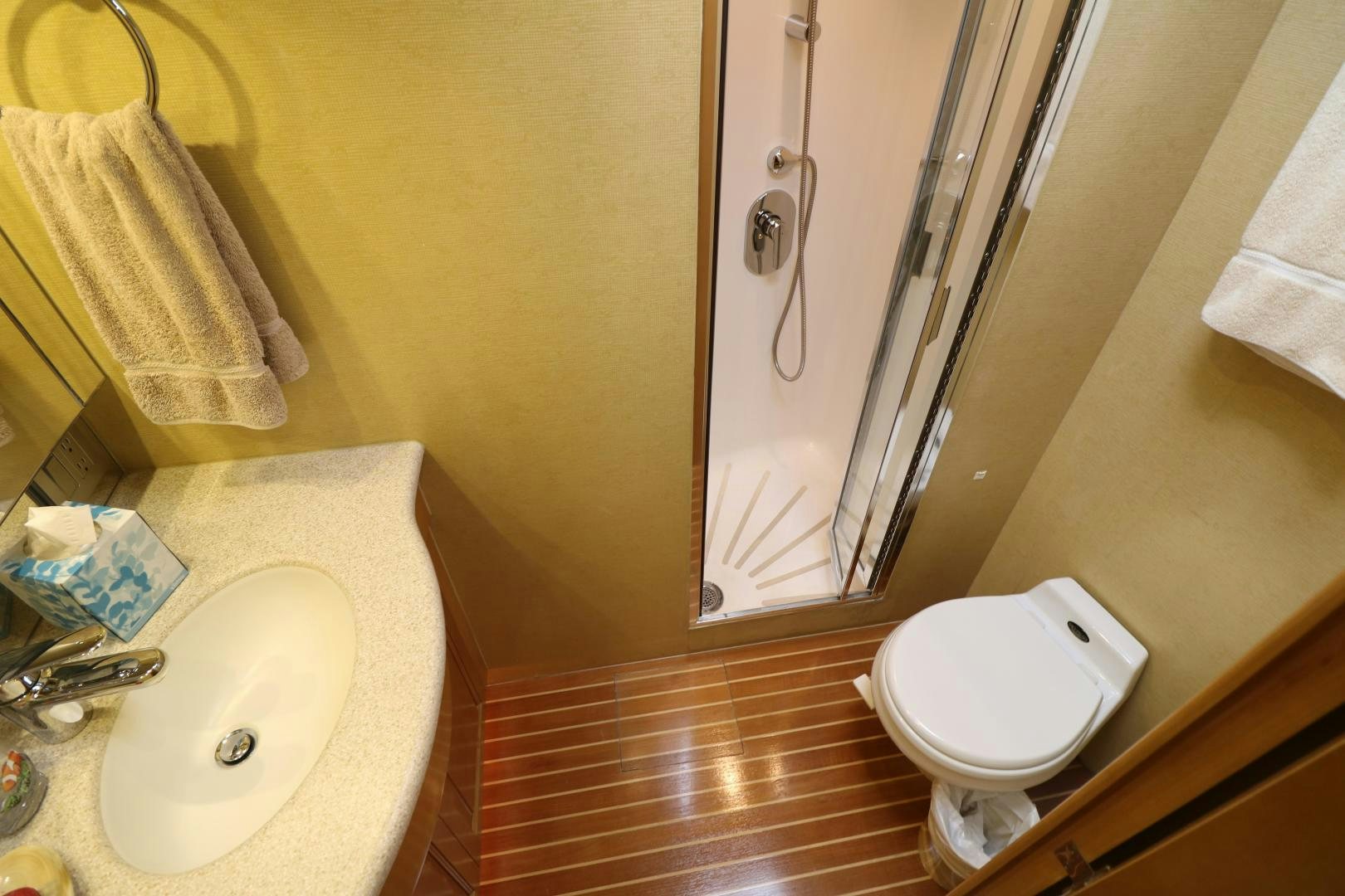 a bathroom with a sink and toilet aboard No Name Yacht for Sale